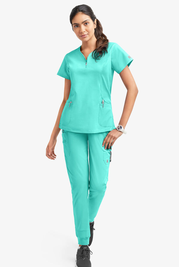 Blusa m&eacute;dica UA Butter-Soft STRETCH con cremallera en el cuello curvo y 4 bolsillos para mujer - Aqua Dust - 2