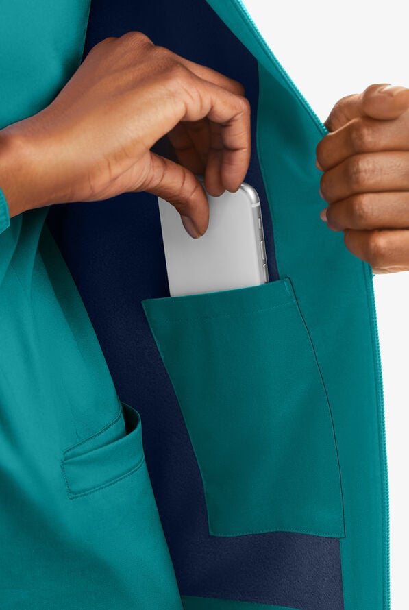 Chaqueta médica unisex UA Butter-Soft STRETCH con forro polar y 3 bolsillos - Teal/Navy - 4