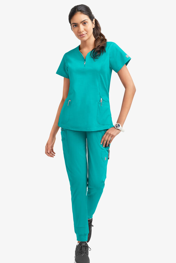 Blusa m&eacute;dica UA Butter-Soft STRETCH con cremallera en el cuello curvo y 4 bolsillos para mujer - Bright Teal - 2