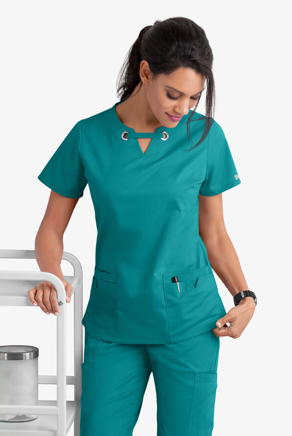 Blusa m&eacute;dica UA Butter-Soft STRETCH con ojales y 4 bolsillos para mujer - Teal - 8