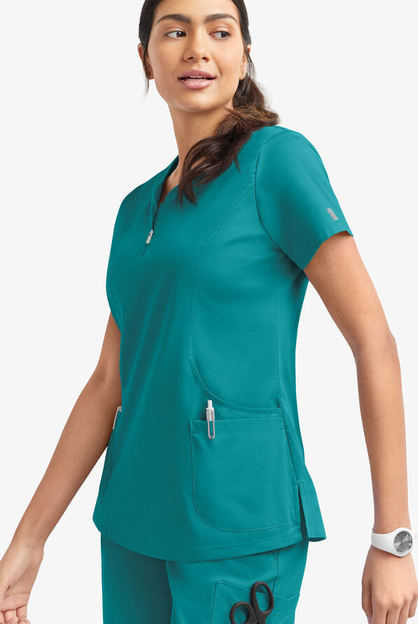 Blusa m&eacute;dica UA Butter-Soft STRETCH con cremallera en el cuello curvo y 4 bolsillos para mujer - Teal - 3