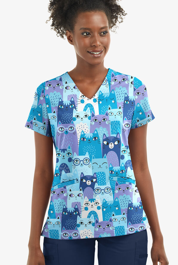 UA Butter-Soft STRETCH Party Time Turquoise Women's 2-Angled Welt Pocket V-Neck Printed Scrub Top - null - 1