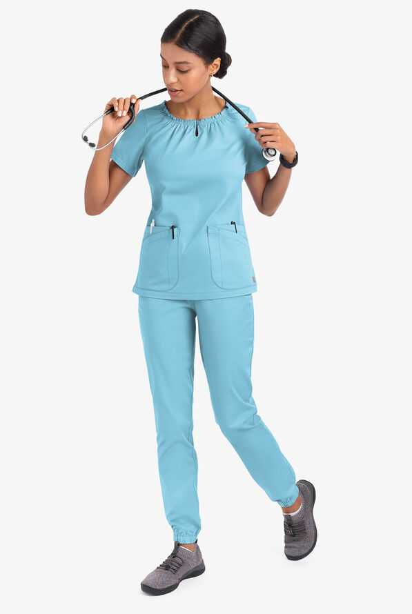 Blusa m&eacute;dica UA Butter-Soft STRETCH estilo campesina con mangas cortas y 6 bolsillos para mujer - Poolside View - 5