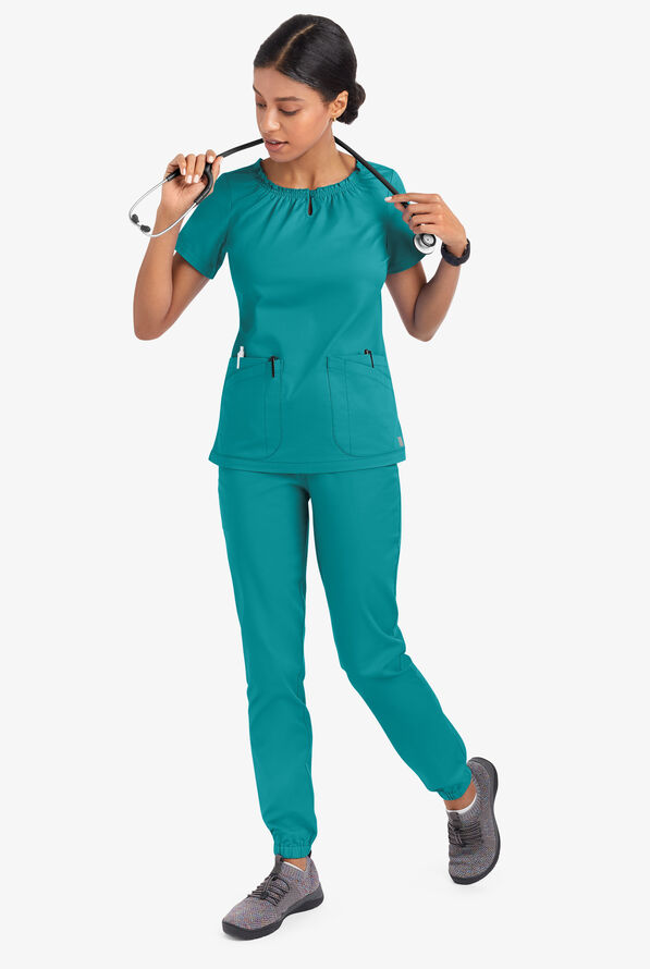 Blusa m&eacute;dica UA Butter-Soft STRETCH estilo campesina con mangas cortas y 6 bolsillos para mujer - Teal - 5