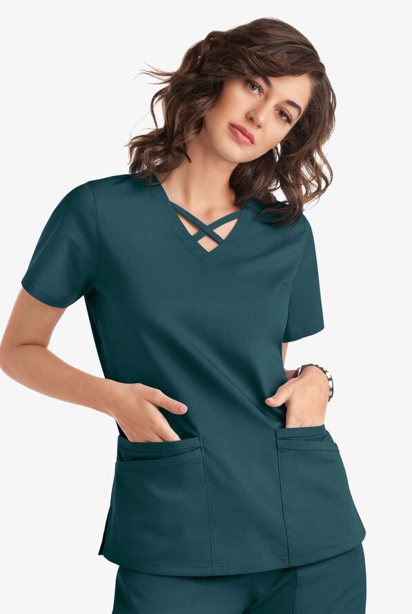 Blusa m&eacute;dica UA Butter-Soft STRETCH con lazos entrecruzados y 4 bolsillos para mujer - Caribbean Blue - 5