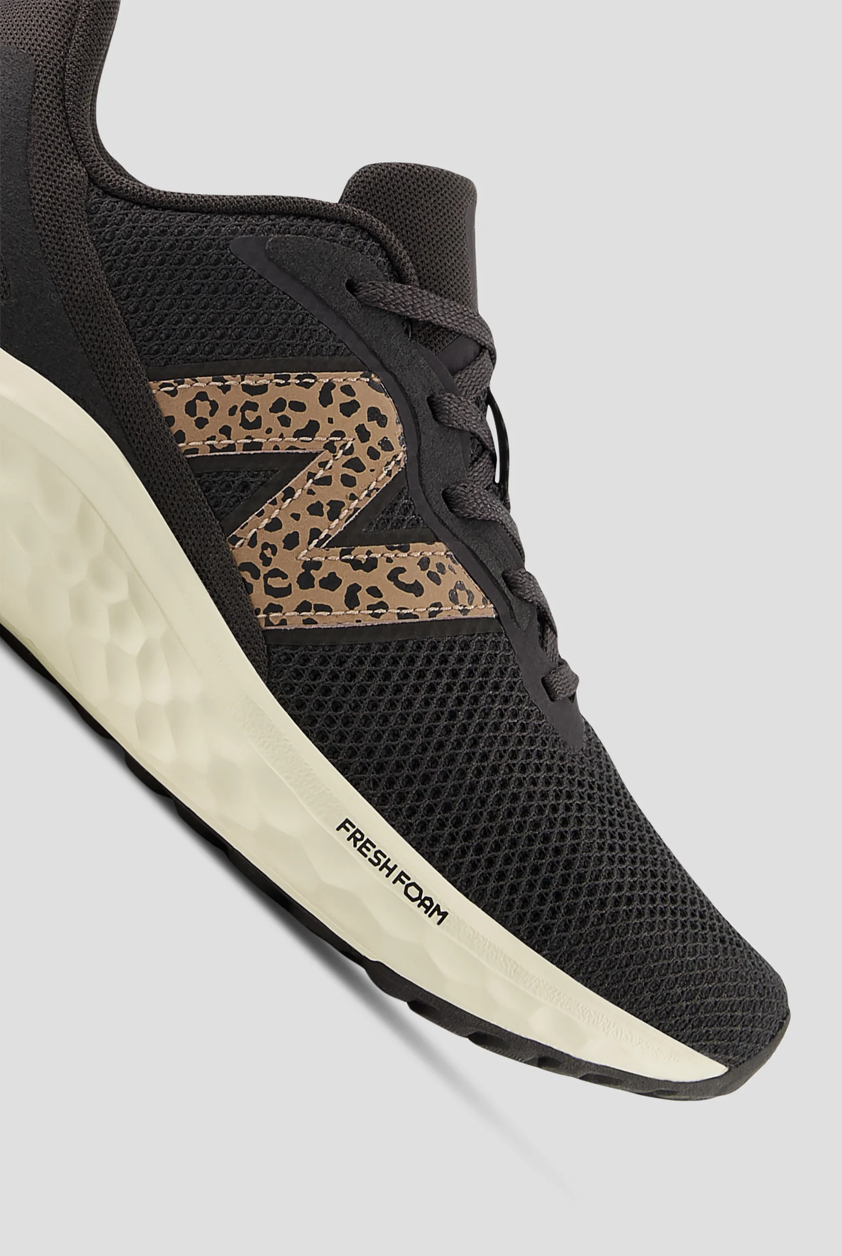 New Balance Women's Arishi Black Cement/Leopard Athletic Lace Up Shoes