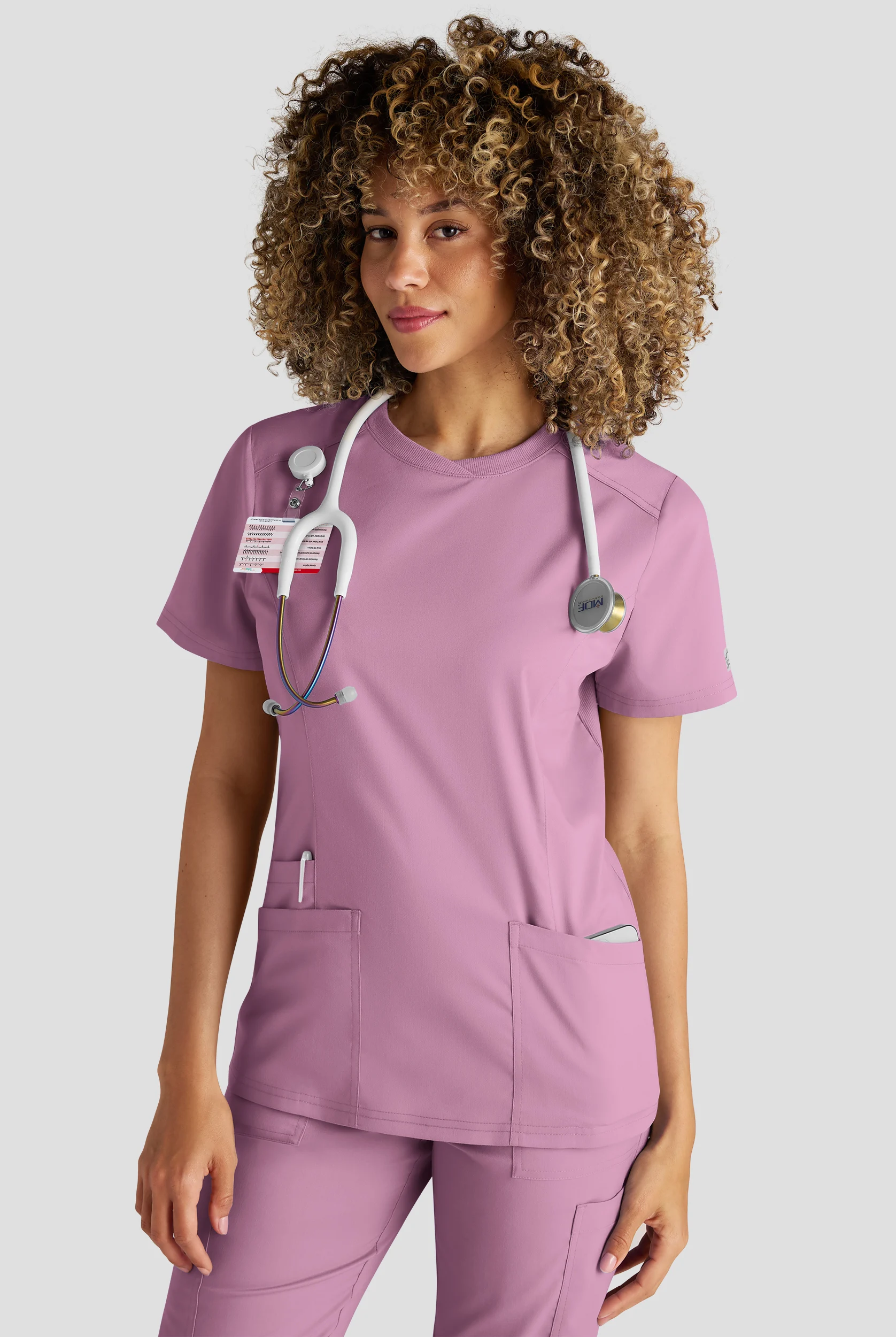 Blusa médica Butter-Soft STRETCH FLXTEK+ con cuello redondo y 3 bolsillos para mujer