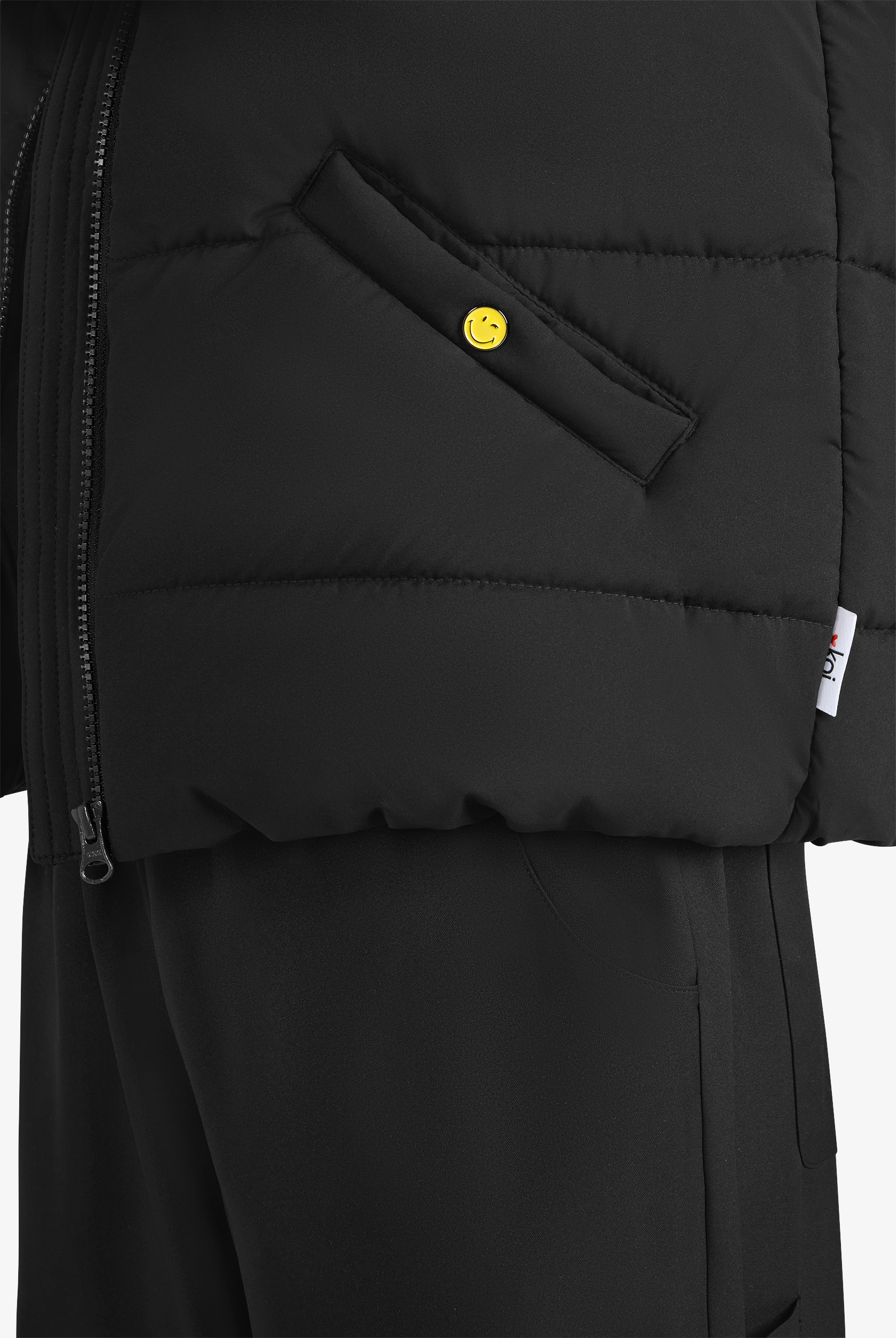 koi Smiley World Delighted Women's 2-Pocket Smiley Embroidered Zip Front Puffed Scrub Vest