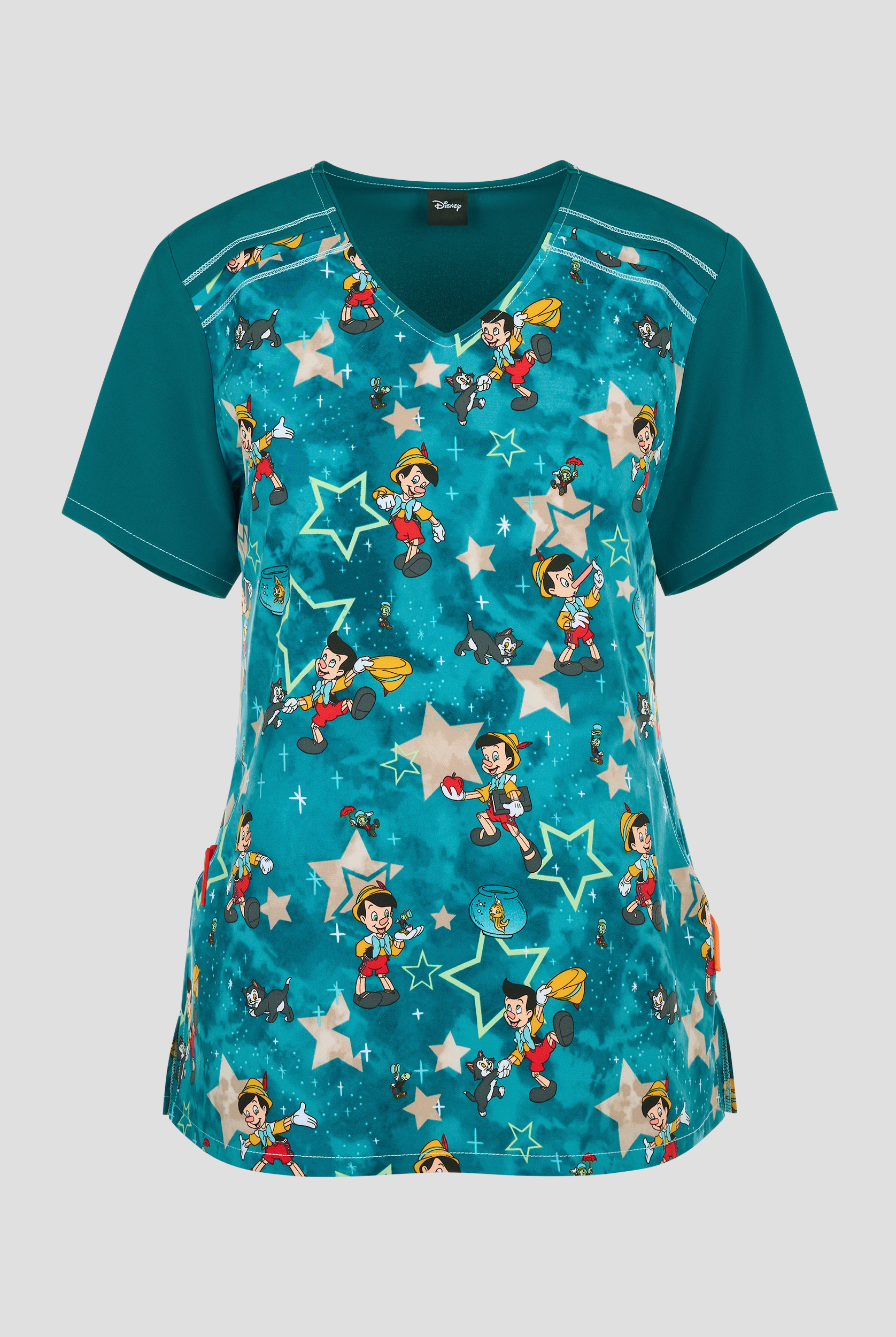 Blusa médica estampada Tooniforms Disney's Pinocchio A Real Boy STRETCH con cuello en V y 2 bolsillos para mujer