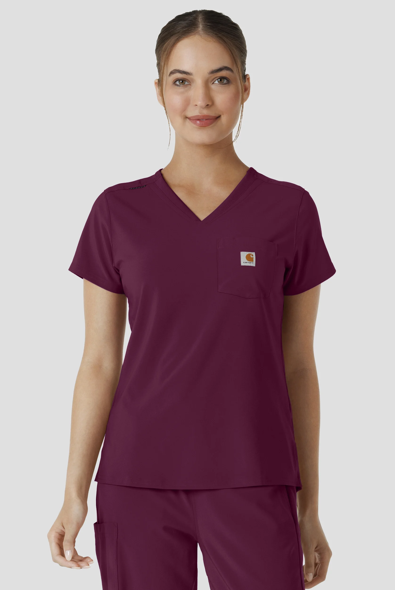 Blusa m&eacute;dica Carhartt Cross-Flex Force STRETCH con paneles de tejido y 1 bolsillo para mujer