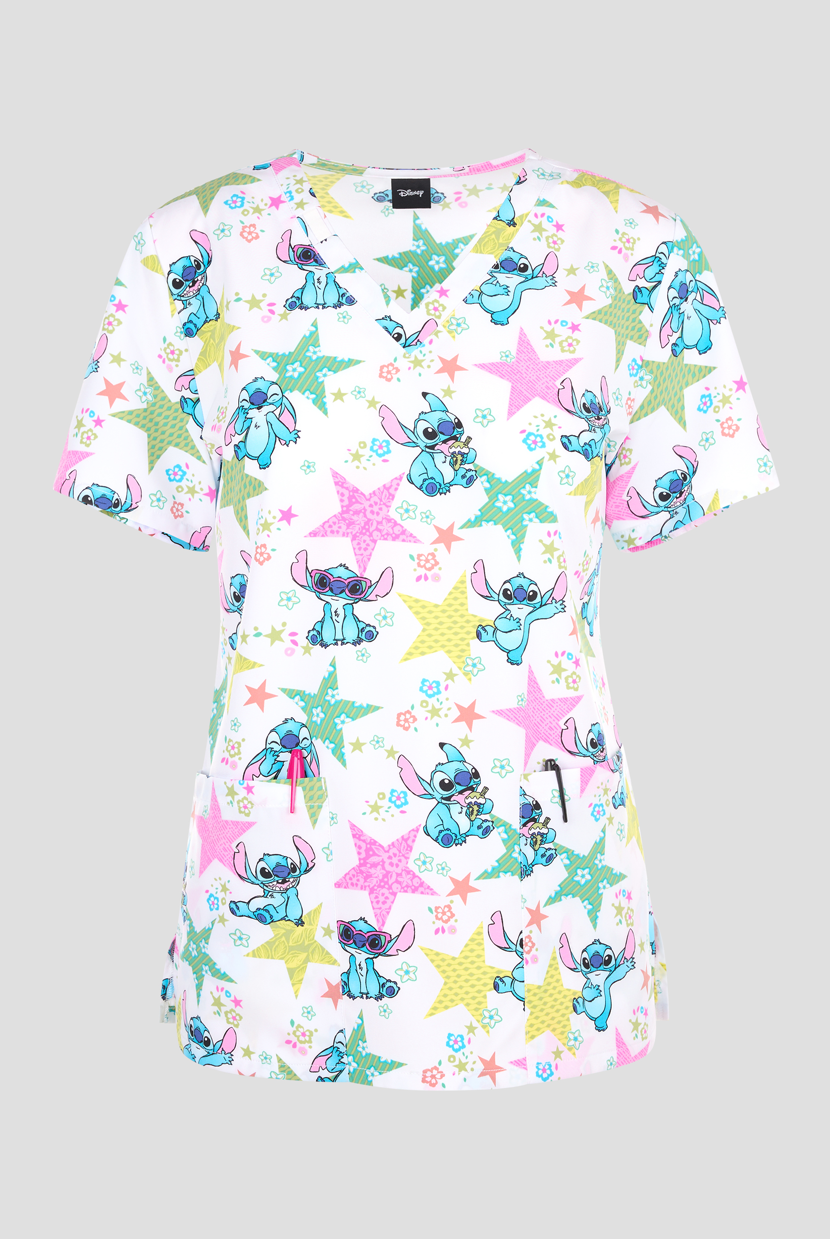 Blusa médica estampada Tooniforms Disney's Star Flower Stitch STRETCH con cuello en V y 2 bolsillos para mujer