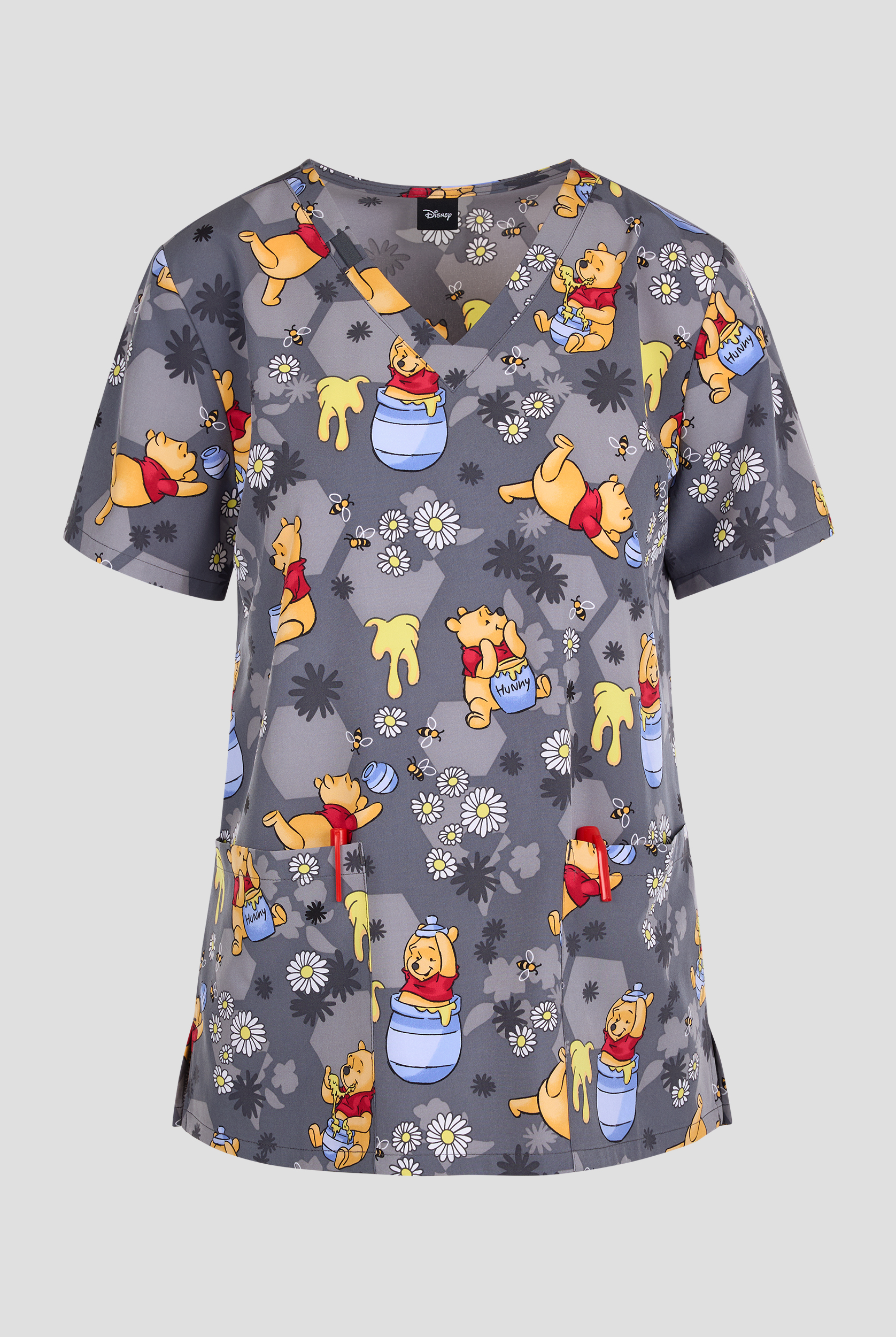 Blusa médica estampada Tooniforms Disney's Honey Business STRETCH con cuello en V y 2 bolsillos para mujer