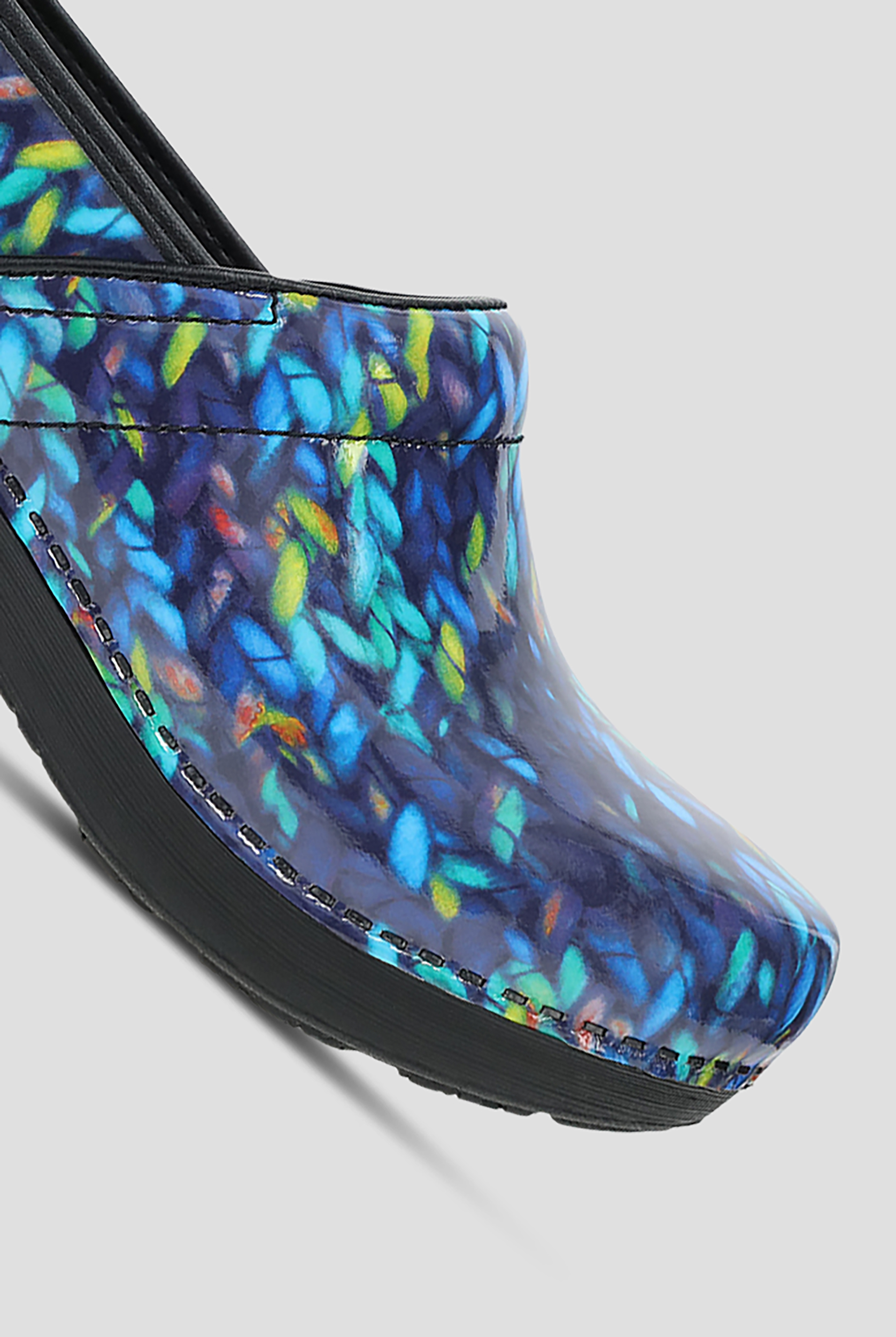 Dansko Women's XP 2.0 Slip Resistant Blue Knit Patent Leather Clogs