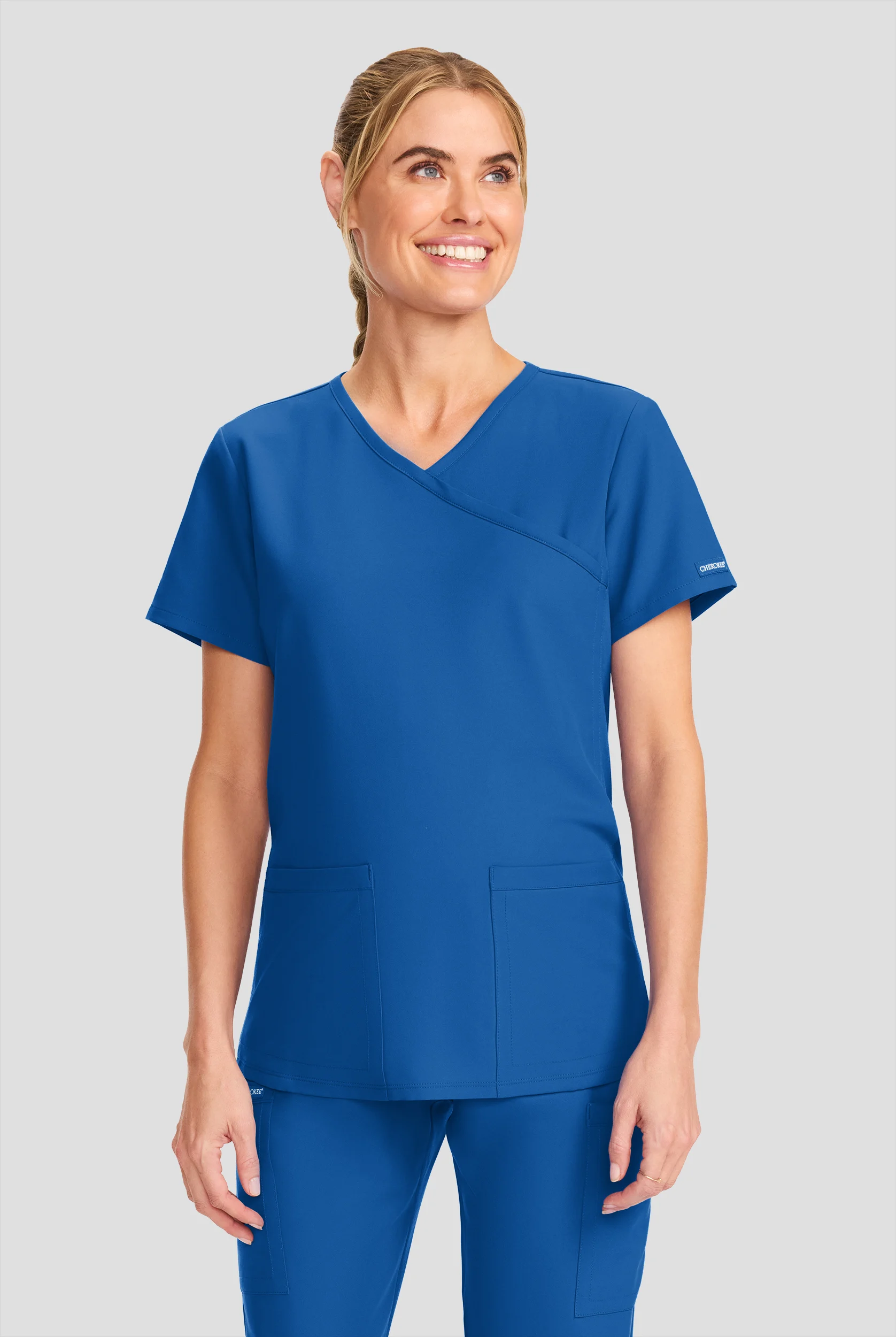 Blusa m&eacute;dica de maternidad Cherokee Workwear Originals Ultra STRETCH estilo cruzado con 2 bolsillos para mujer