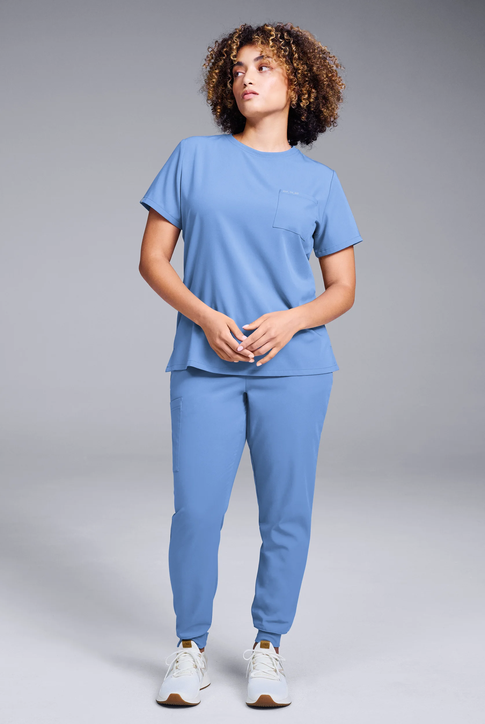 Conjunto de uniforme médico Hypothesis estilo jogger con cuello redondo para mujer